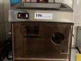 a machine that is sitting on a counter in a kitchen