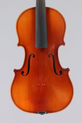 an old violin with a bow on a white background