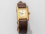 an image of a wrist watch with a brown leather strap