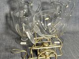 deux vases en verre transparent posés sur un chariot en métal
