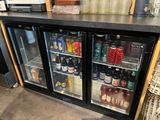 a refrigerator that has a lot of drinks inside of it