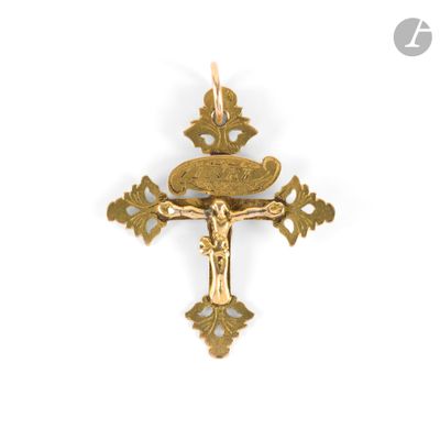 a close up of a cross with a crown on it