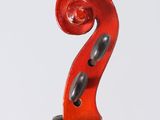 a close up of a violin with a red bow on a white background