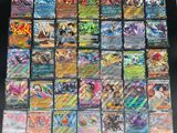 a large collection of pokemon cards on display in a box