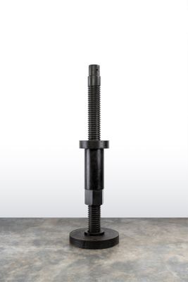 a close up of a metal pole with a screw on it