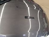 a close up of a motorcycle with a sticker on it