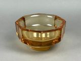 a glass bowl that is sitting on a table