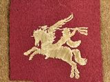 a close up of a piece of cloth with a picture of a horse on it