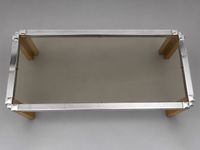 Table basse, le piètement tripartite en métal et laiton, le … (photo 2)