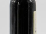 a bottle of wine that is sitting on a table
