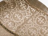 a close up of a vase with a decorative pattern on it