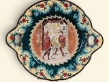 a plate with a picture of a man and a woman on it