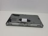 a laptop that has a broken cover on it