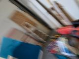 a blurry photo of a man riding a skateboard