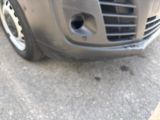 a close up of a car ' s front bumper