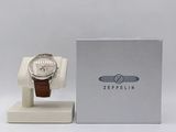 an image of a watch sitting on top of a white box