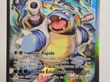 une image représentant une carte à collectionner Pokémon sur laquelle figure l'image d'un personnage Pokémon