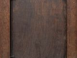 a picture of an old wooden picture frame on the wall