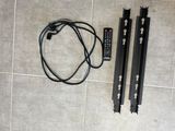 two remote controls and a remote control on the floor