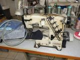 a sewing machine that is sitting on a table