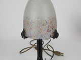 a lamp that is sitting on top of a table