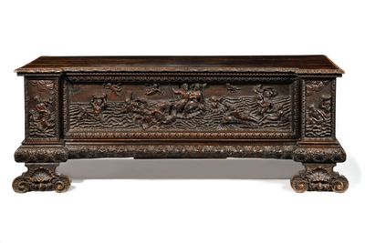 an old wooden trunk with carvings and carvings on the sides