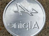 silver plate with the number 44 on it sitting on the ground