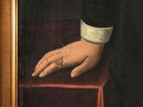 portrait of a man with a ring on his left hand