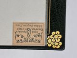 a picture of a picture of a book with a flower on it