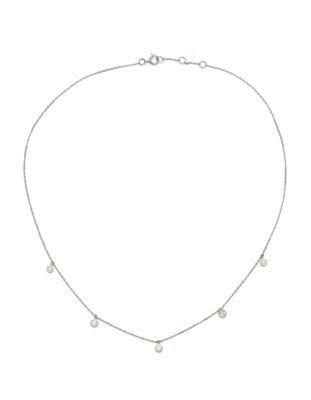 a white gold necklace with diamonds on a white background