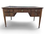 a wooden desk with two drawers and a marble top
