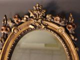 a mirror that is hanging on the wall in the room