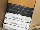 a cardboard box with a bunch of books inside of it