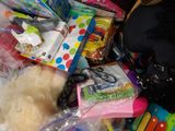 a pile of children ' s toys and toys on the floor