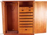 a wooden armoire with drawers and a door open