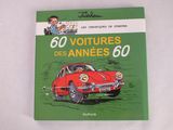 un livre sur lequel figure l'image d'une voiture rouge