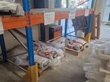 many boxes of food sitting on the shelves in the warehouse