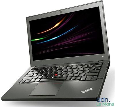 a close up of a laptop computer on a white surface