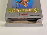 a box of nintendo games on a white surface