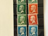a picture of a group of stamps with a picture of a man on it