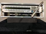 an image of a keyboard and a microphone on a table