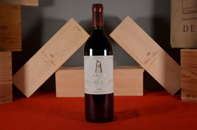 a bottle of wine that is sitting on a table