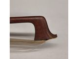a close up of a violin bow on a white background