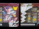 two boxes of pokemon trading cards on display in a store