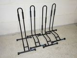 a rack that has four pairs of skis on it