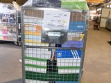 a cart with a lot of boxes on it in a warehouse