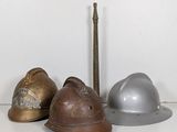 three helmets sitting next to each other on a table