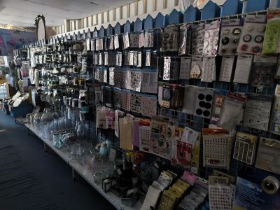 many items on the table in the store for sale