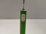 an electric toothbrush sitting on top of a white table