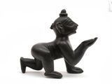 figurine of a woman kneeling on her knees holding her hands up